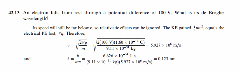 An electron falls from rest through a potential difference of 100 V. What is its