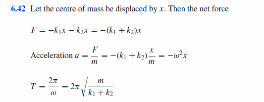 A mass m is placed on a frictionless horizontal table and is connected to fixed 